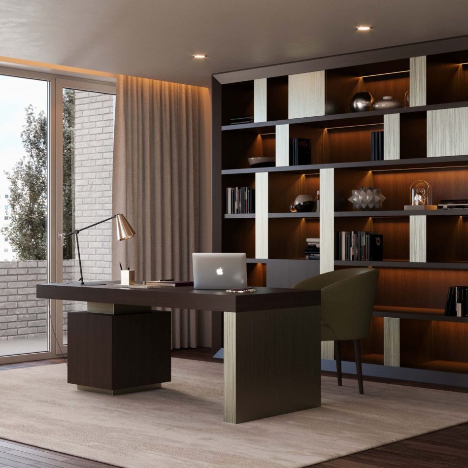 The Fortune Chair in deep green leather brings comfort and elegance to the workspace, with its curved arms, deep back and soft, enveloping silhouette. Paired with a dark wooden desk and a geometric bookshelf with warm lighting, the room feels elegant and organised. The atmosphere blends sculptural modern furniture design, curated contemporary decor and the calm clarity of minimalist interiors.