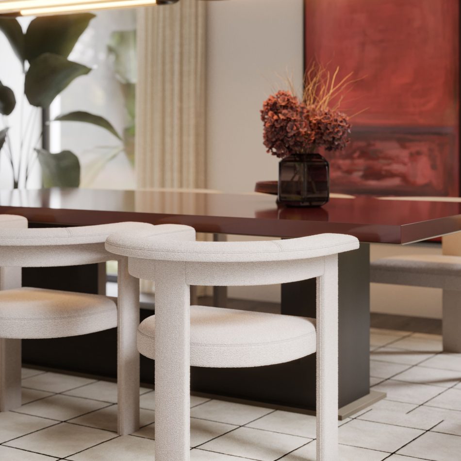 The Fortune Dining Table features a glossy deep‑red top complemented by beige upholstered chairs, a dark vase with dried florals, and soft natural light. The setting balances bold artwork and greenery, reflecting modern dining table design, expressive wood texture, and sophisticated luxury furniture.