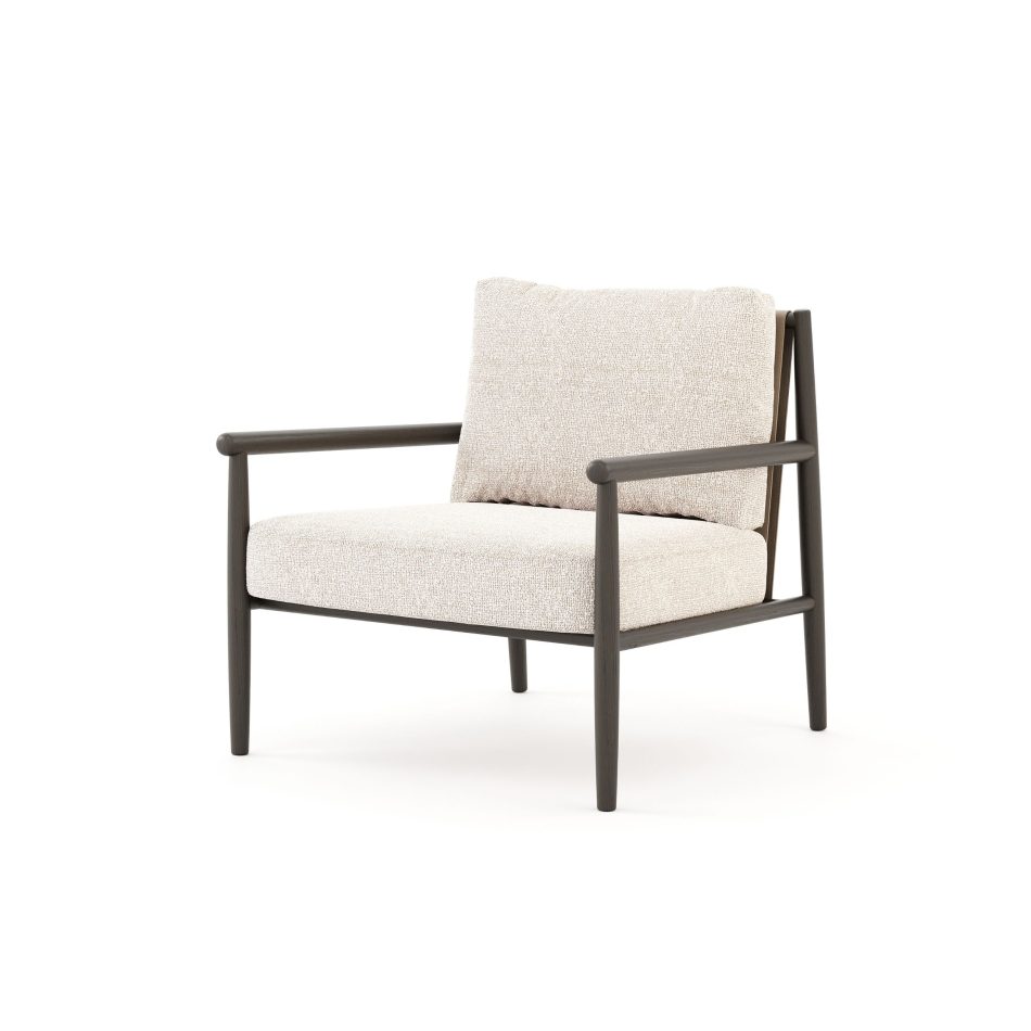 The Landform Armchair in dark oak with plush bouclé cushions and a leather-backed frame, a Nordic-inspired piece of luxury living room furniture blending wood texture and comfort.