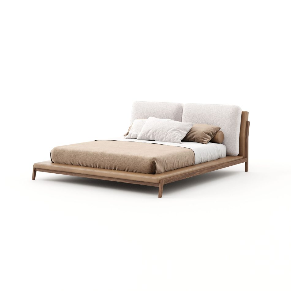 The Milos Bed shown at an angle, its matte walnut frame paired with a tan leather base and a two-panel bouclé headboard in soft ivory, dressed with brown and white linen. The clean lines and mixed materials reflect a considered approach to luxury bedroom furniture, suited to minimalist bedroom architecture.