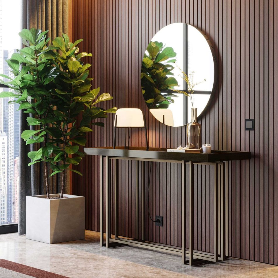 The console stands beneath a large round mirror, paired with a sculptural lamp, a glass vase, and small decorative accents. A tall potted plant and floor‑to‑ceiling curtains frame the space, blending the console’s clean lines with the room’s modern architecture and city views. The composition reflects modern furniture, refined living room inspiration, and the quiet elegance of luxury home furniture.