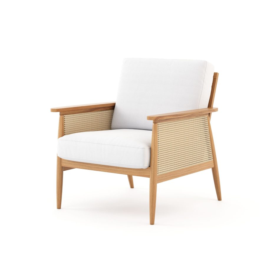 A Natur Armchair with a light wooden frame, woven cane panels, and soft white upholstery, showcasing its blend of natural materials and gentle craftsmanship. The curved lines and airy structure highlight the purity of minimalist design, the tactile warmth of modern furniture, and the quiet elegance that defines luxury furniture inspired by simplicity.