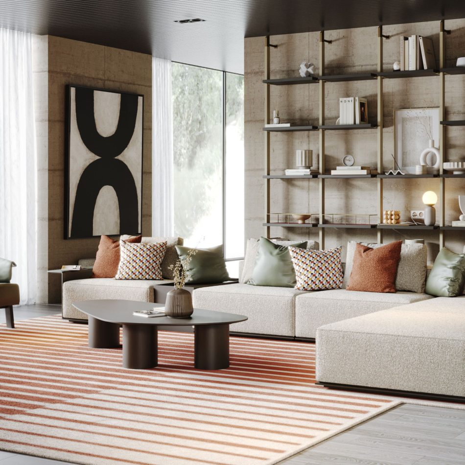 The Natur Coffee Table in a dark wood finish sits before a light beige sectional, styled with a ribbed vase and dried branches on a warm striped rug. Shelving, books, and an abstract artwork frame the space with soft natural light. The scene blends refined living room furniture with calm, textural living room inspiration and the clean balance of contemporary furniture.