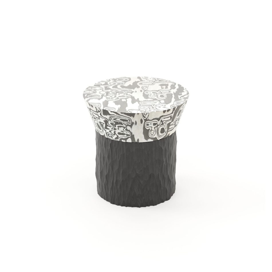 The Toro Side Table II pairs a carved wooden base with a smooth patterned top, creating a striking contrast between texture and refinement. Its sculptural form adds depth to interiors, offering a distinctive accent for side tables, enhancing the character of home decor, and introducing a bold touch to interior design compositions.