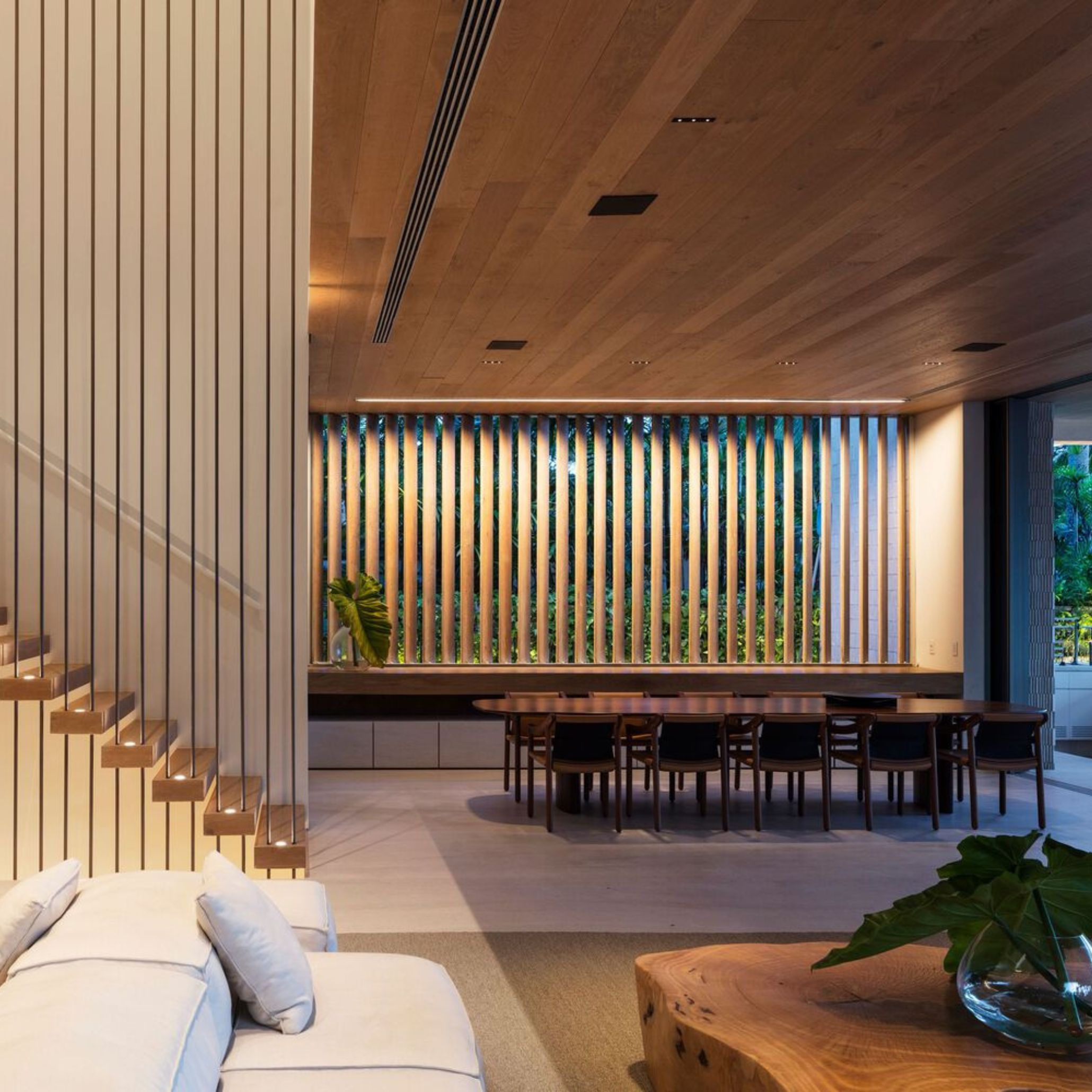 JD House dining area characterised by the use of wood.