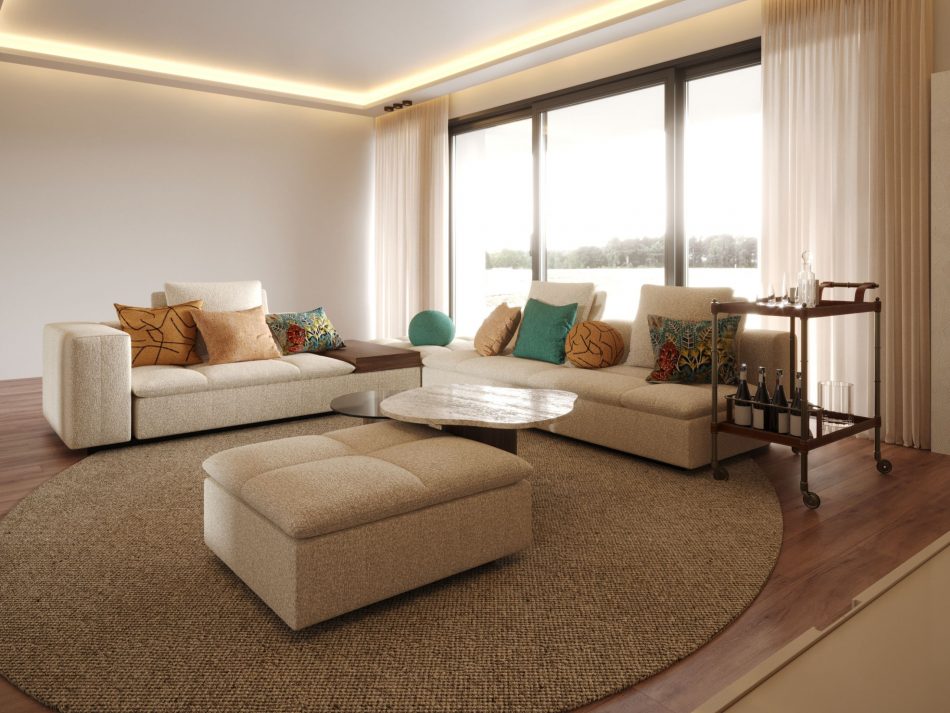 A cozy cinema room with the Margem Sofa, colorful cushions, and the Natur Side Tables.
