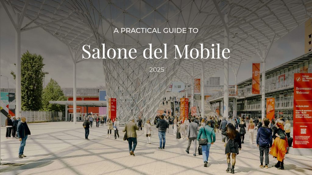 Main entrance of the iSaloni fair in Milan, with visitors arriving at the venue.