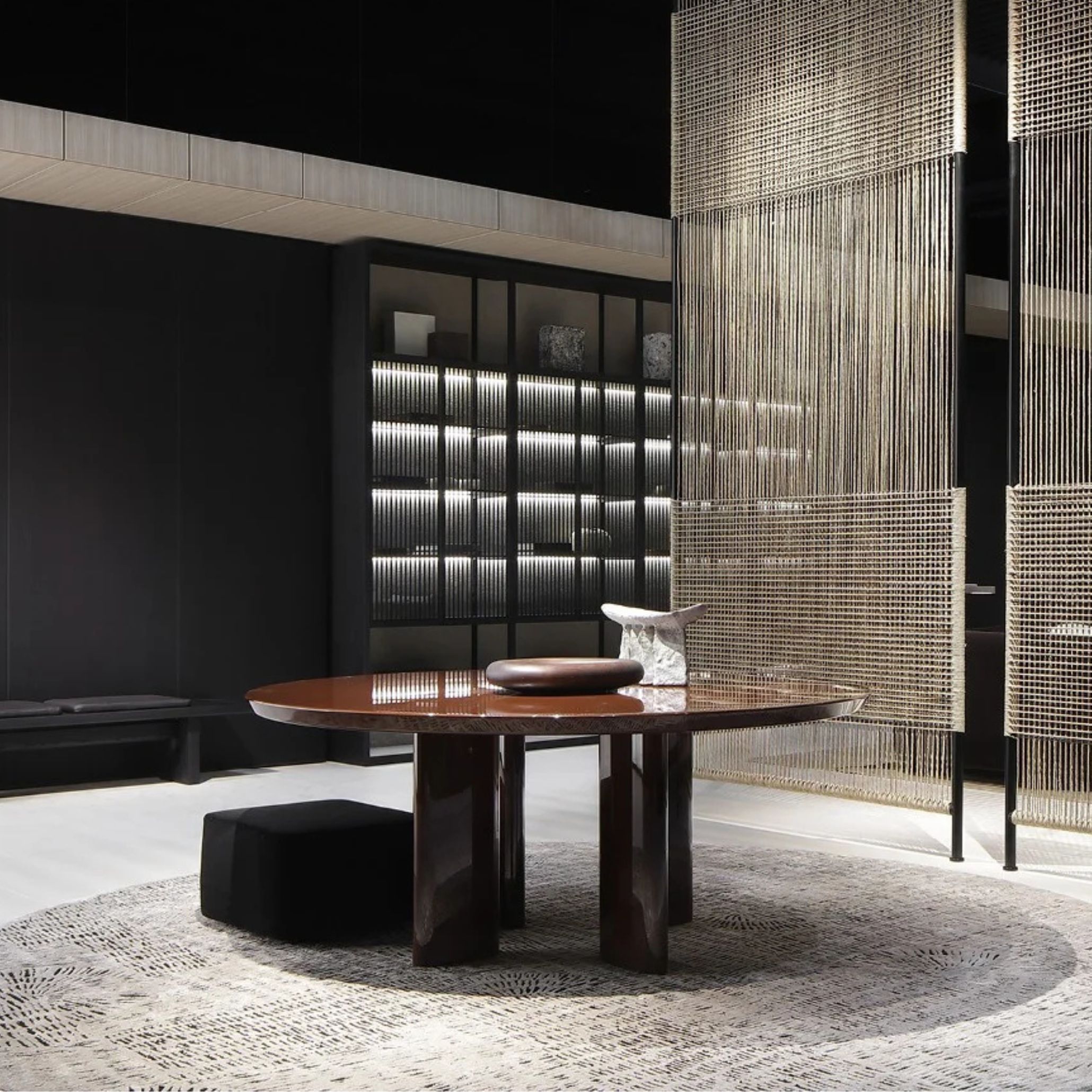 A brown high-gloss table reflecting the 2025 trend of polished finishes that add warmth and sophistication to modern interiors.