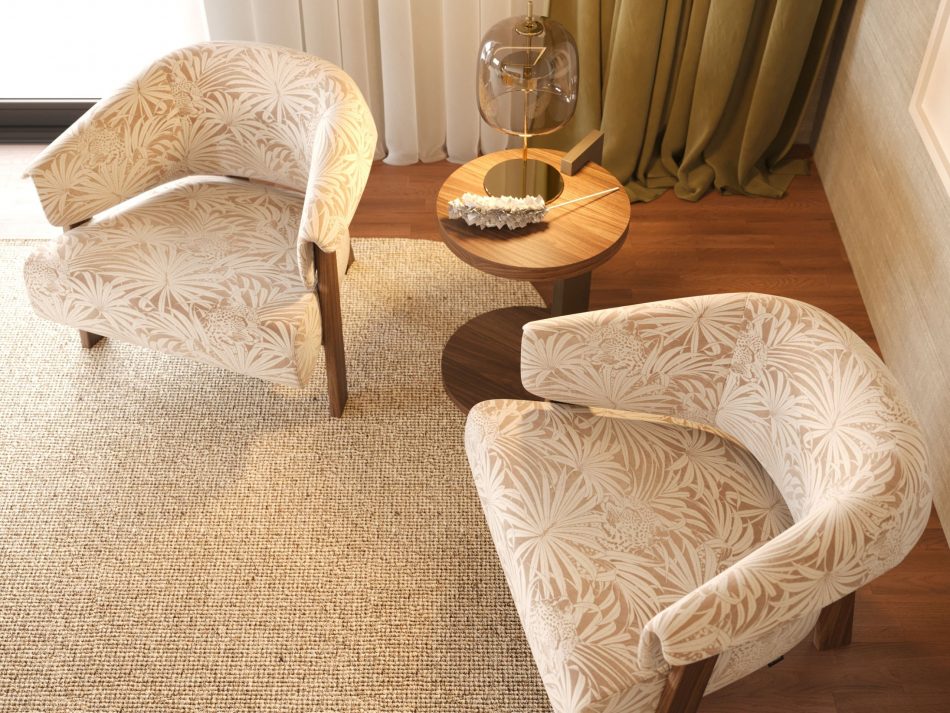 The Suite's sitting area featuring the Toro Armchair with a organic pattern and Club Side Table, designed for relaxation and elegance.