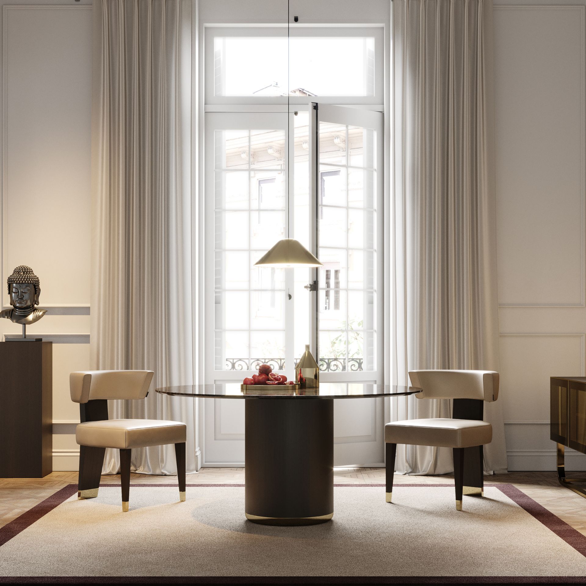 Her dining table accompanied by two chairs from the same collection.