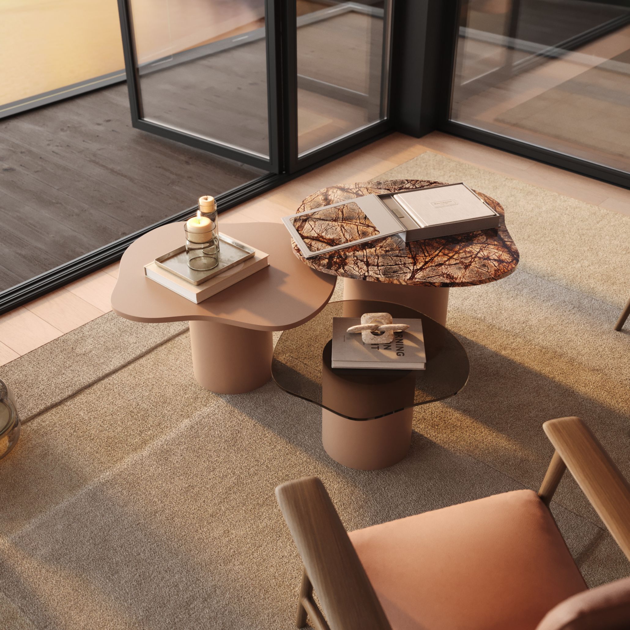 The Natur Set of Side Tables in wood, glass, and marble finishes, arranged over a neutral carpet and paired with soft upholstered seating.