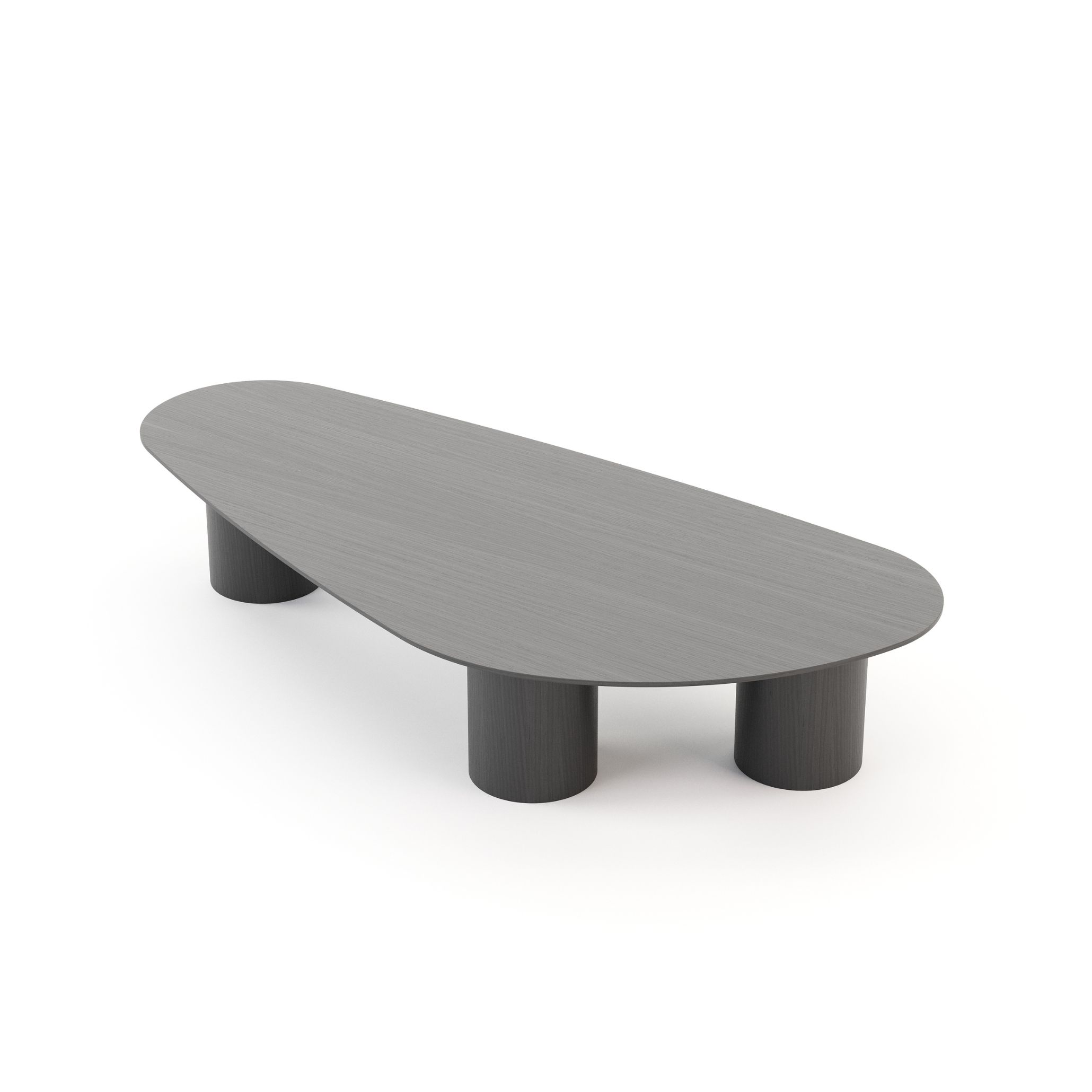 Natur Coffee Table with curved lines and cylindrical legs in dark wood, adding movement and depth to a contemporary coastal-inspired space.