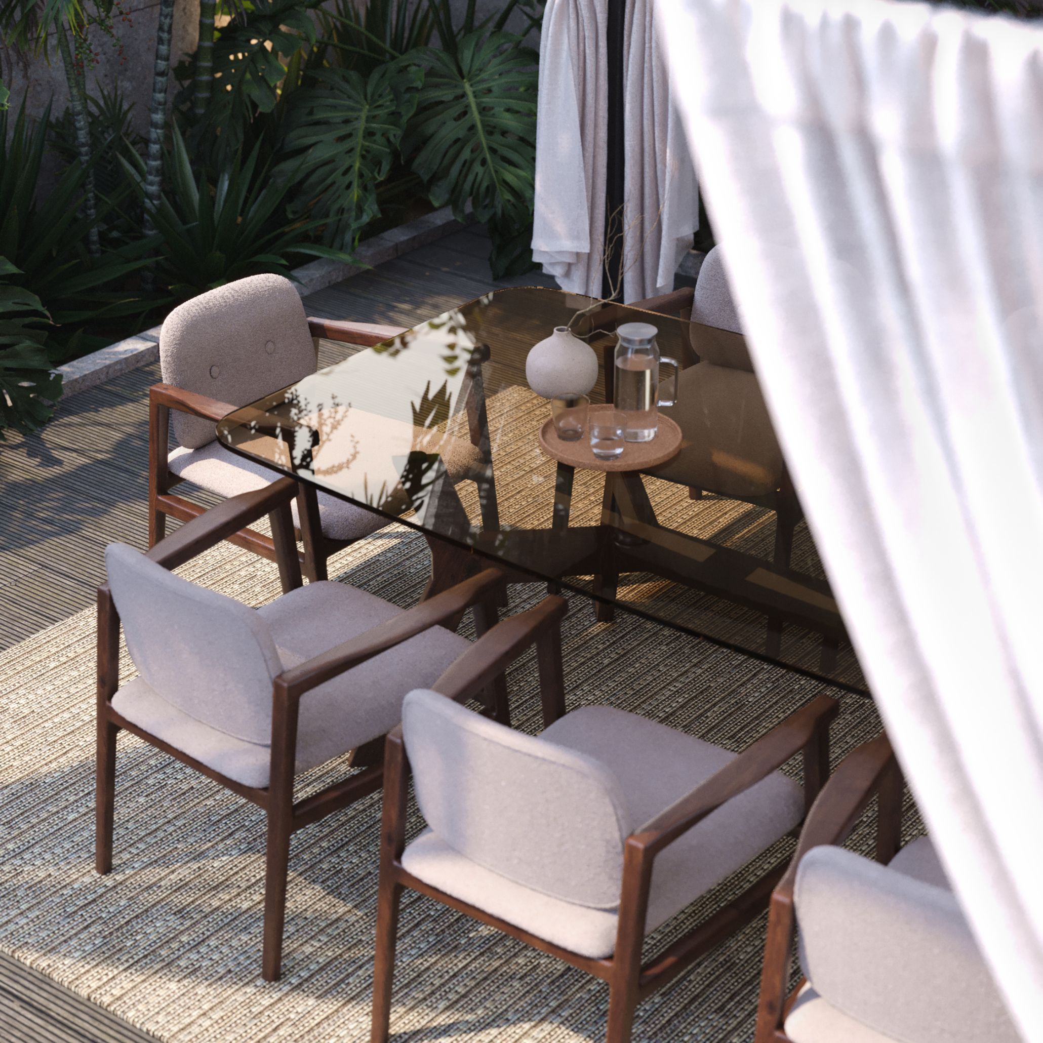 Outdoor dining table setup in a tropical garden featuring the Toro Dining Table with a smoked glass top and sculptural black legs, paired with Toro II Chair in walnut wood and beige upholstery. The combination of bold geometry, warm materials, and soft textiles creates a refined, modern alfresco dining table decoration. A woven outdoor rug and minimal ceramic accents enhance the serene, nature-inspired ambiance.