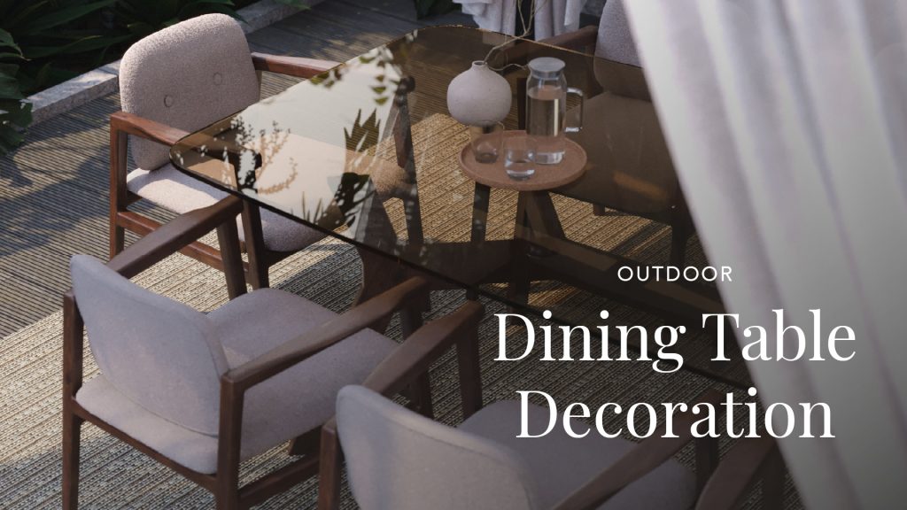 Refined summer outdoor dining table setup featuring the sculptural Toro Dining Table paired with curved Toro II Chairs, styled with elegant ceramic tableware, linen napkins with aromatic herbs, a glass jug infused with citrus and edible flowers, and seasonal flower arrangements. Set on a textured rug and bathed in natural light, this alfresco dining scene captures the essence of elegant outdoor decoration, blending organic textures, thoughtful details and timeless modern furniture design.