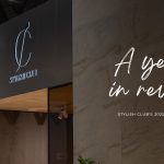 Entrance of Stylish Club with illuminated signage and branding for “A Year in Review: 2025 Highlights.” The setting reflects a year of innovation, global presence, and elegant design milestones. A visual summary of the brand’s journey through craftsmanship, creativity, and transformative projects.