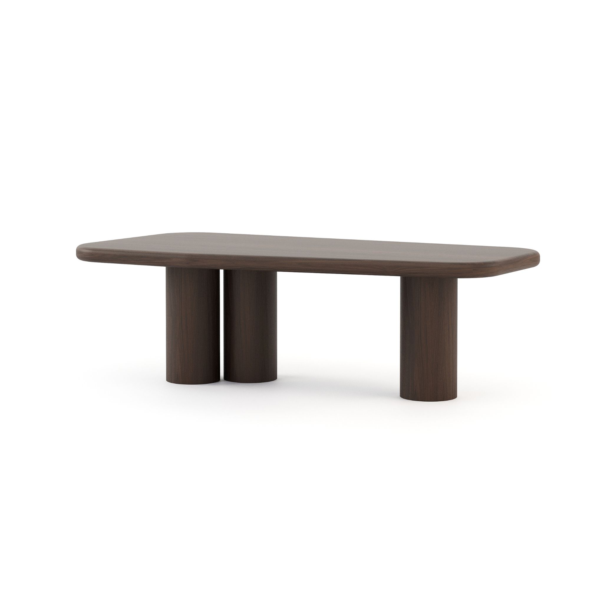 Organic‑shaped dining table in a dark wood finish with rounded edges and sculptural cylindrical legs, reflecting the Natur Collection’s blend of architectural clarity and natural movement. Its minimalist form brings practicality and elegance into a Transitional Interior Design space, grounding the room with quiet sophistication.