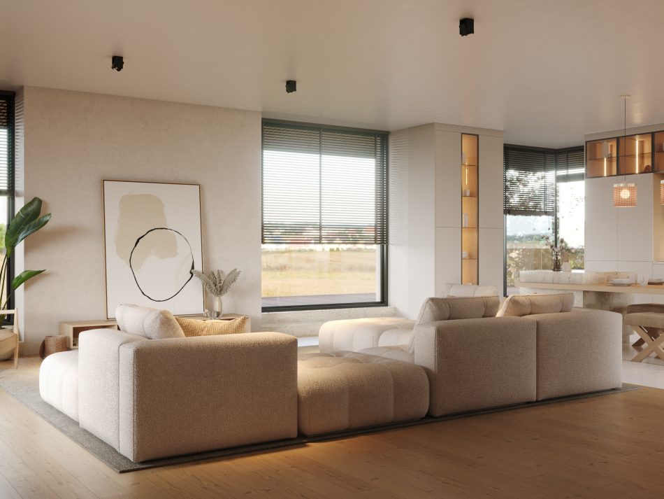 Antónia Sofa in light beige bouclé, modular and plush, viewed from behind in a minimalist living space with abstract art, built-in shelving, and a stone dining table.