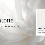 A Pantone colour swatch displaying Cloud Dance, set against a soft, ethereal white floral backdrop. The composition announces Pantone’s Colour of the Year 2026, highlighting the luminous, airy quality of this near-white hue. The delicate floral texture reinforces Cloud Dancer’s role as a blank canvas - inviting creativity, balance, and quiet sophistication across design disciplines.