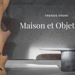 Banner featuring a sculptural wooden form and a minimalist stone table set against a textured gray wall, visually introducing the theme “Trends from Maison et Objet 2026.” The composition reflects the fair’s focus on heritage reinterpreted through contemporary design, highlighting the dialogue between crafted materials, expressive forms, and forward‑looking interior aesthetics.