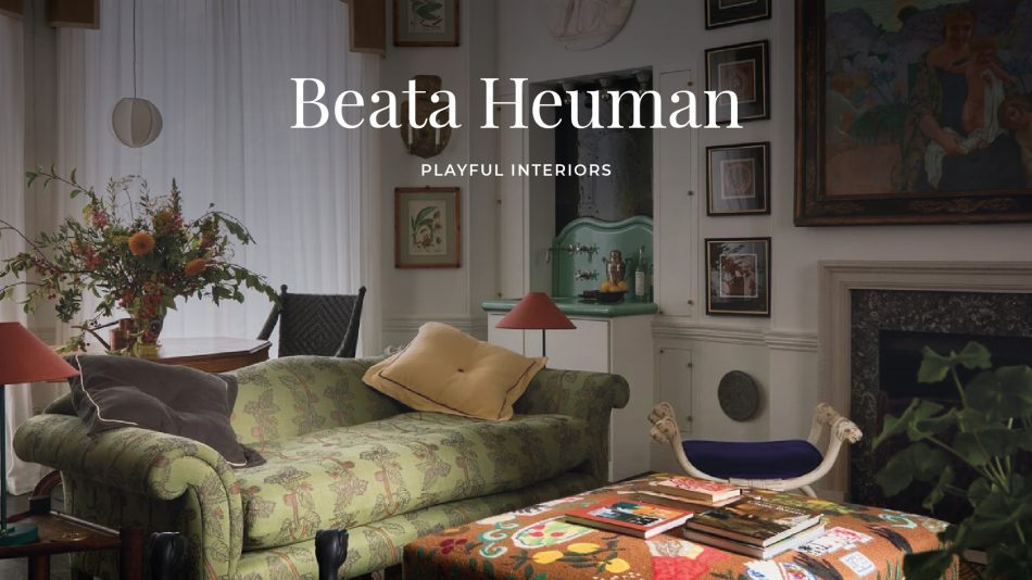 Banner image featuring a green patterned sofa, an eclectic coffee table with books, and a sculptural white‑and‑blue chair, framed by layered artwork and natural light, expressing Beata Heuman’s playful approach to luxury living room furniture, home furniture, and wood texture elements within Colourful Interior Design.