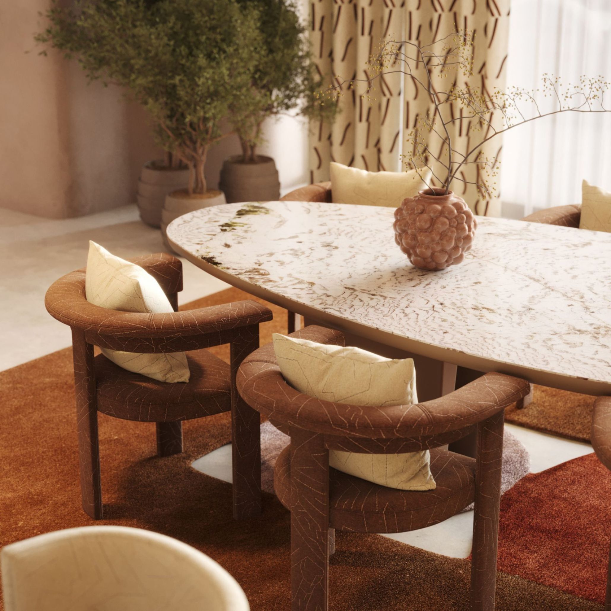 A contemporary dining room featuring a marble Stone Dining Table with soft veining, surrounded by curved dining room furniture in warm, tactile upholstery. The space highlights contemporary dining table design through its organic shapes, subtle design details, and the presence of luxury furniture elements, including sculptural décor and natural textures that create an elegant, grounded atmosphere.