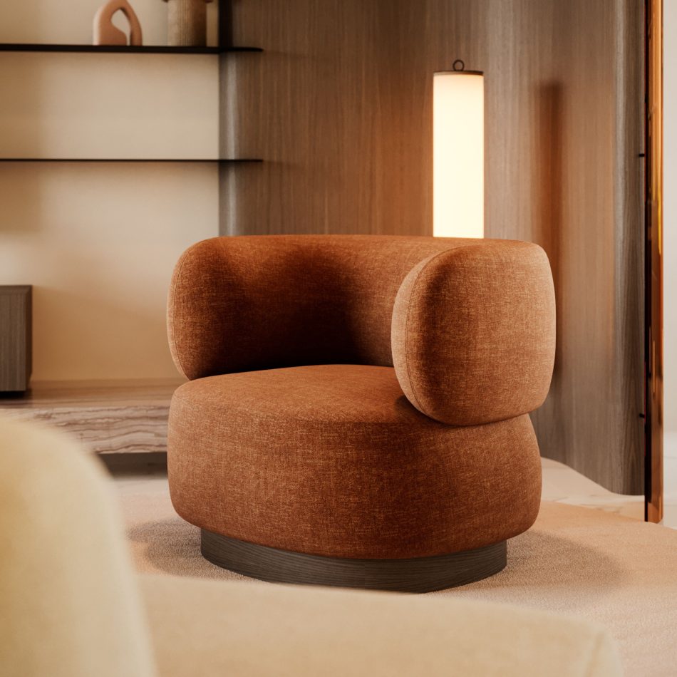 A rust‑colored Dolomites Armchair with rounded, sheltering curves sits on a dark wooden base within a minimalist corner defined by warm lighting, floating shelves, and muted beige walls, creating a tranquil ambiance where the armchair’s mountain‑carved inspiration harmonizes with the tactile calm of home furniture, the sculptural presence of luxury home furniture, and the intimate warmth associated with bespoke spaces.