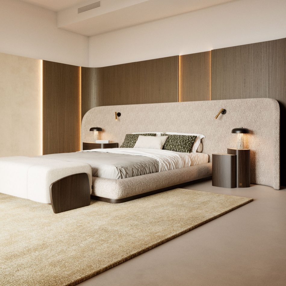 A peaceful master bedroom features the Dolomites Side Table alongside a curved upholstered headboard, where the table’s sculptural oak base and marble top echo the room’s warm palette, soft lighting, and refined textures, creating an atmosphere of quiet elegance that resonates with high end bedroom furniture, the crafted purity of bedroom furniture, and the understated sophistication of luxury master bedroom furniture.