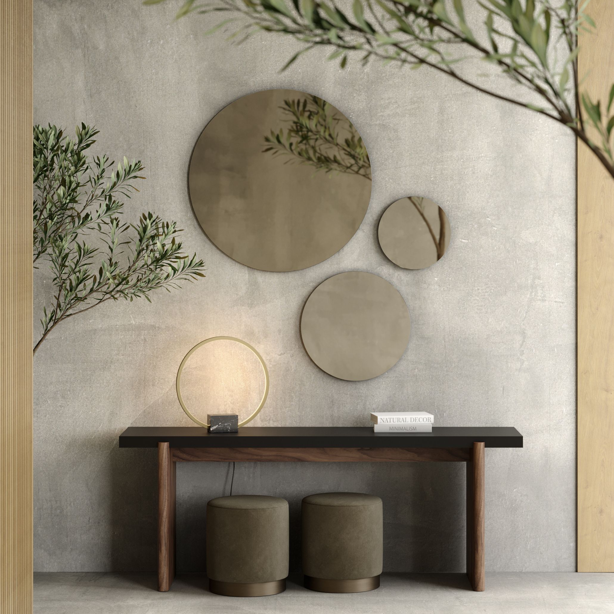 A minimalist Natur Console arrangement featuring bronze‑tinted circular mirrors and a sleek table with sculpted wooden legs, embodying the Natur Collection’s fluid, nature‑inspired aesthetic. Soft lighting, curated decor, and rounded stools create a calm, modern atmosphere where organic shapes meet luxury home furniture sensibilities. The reflective surfaces and gentle curves highlight the collection’s focus on harmony, movement, and contemporary furniture design rooted in natural form.