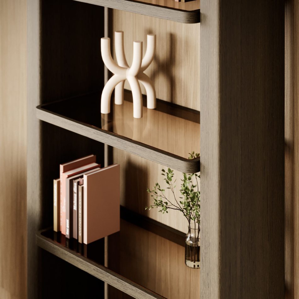 The Foz Bookcase reveals its artistry up close, where rounded wood edges and carefully spaced shelves create a gentle rhythm reminiscent of water moving toward the sea. Decorative objects, books, and touches of bronze glass introduce soft reflections that enrich the warm, minimalist composition, harmonizing with handmade furniture, the organic elegance of living room design, the quiet balance of home furniture, and the thoughtful purity of modern furniture.