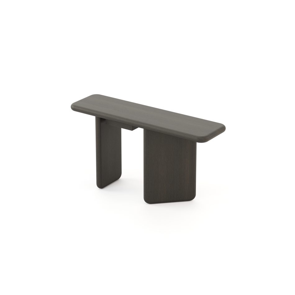 The Foz Console is shown as a modern solid‑wood piece with a deep, uniform tone. Its rectangular top features rounded edges that emphasize precise detailing. Two organic vertical legs give it a strong architectural presence suited for luxury furniture settings. The clean structure works well within contemporary living room furniture layouts. The design aligns naturally with refined home furniture environments.