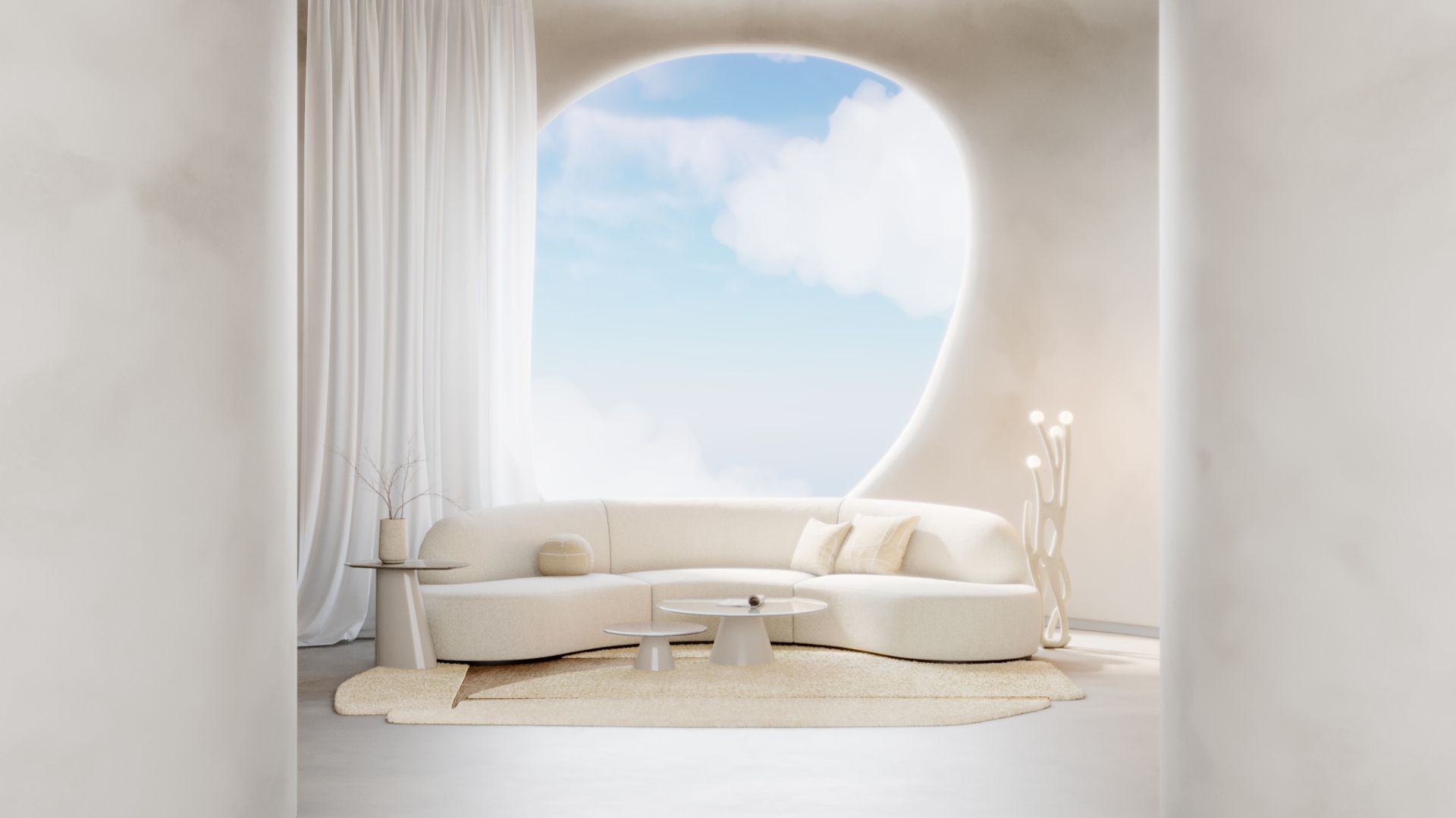 A serene living space featuring the cotton sofa cream‑coloured sofa, round coffee tables, and soft natural light streaming through an organic‑shaped window. The gentle textures and sculptural forms create a calming sensory atmosphere, supported by the tactile richness of bouclé upholstery, the warmth of organic textures, and the refined presence of modern furniture that encourages moments of rest and emotional ease.