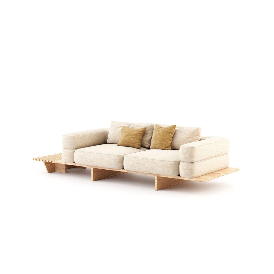 The Ripa Sofa shows its extended wooden platform and generous cushions, where the interplay of structure and softness reflects thoughtful craftsmanship aligned with modern furniture, the sculptural clarity of luxury home furniture, and the composed elegance of living room furniture.