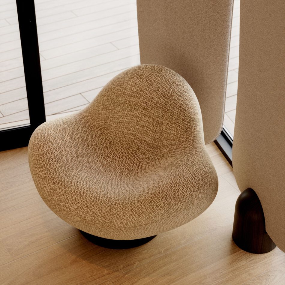 The Stone Armchair rests on a light wooden floor beside a large window, its rounded beige upholstery and wod circular base echoing river‑stone softness while the natural daylight and minimalist setting create a calm ambiance shaped by refined modern furniture, warm living room inspiration, and the organic elegance of luxury home furniture.