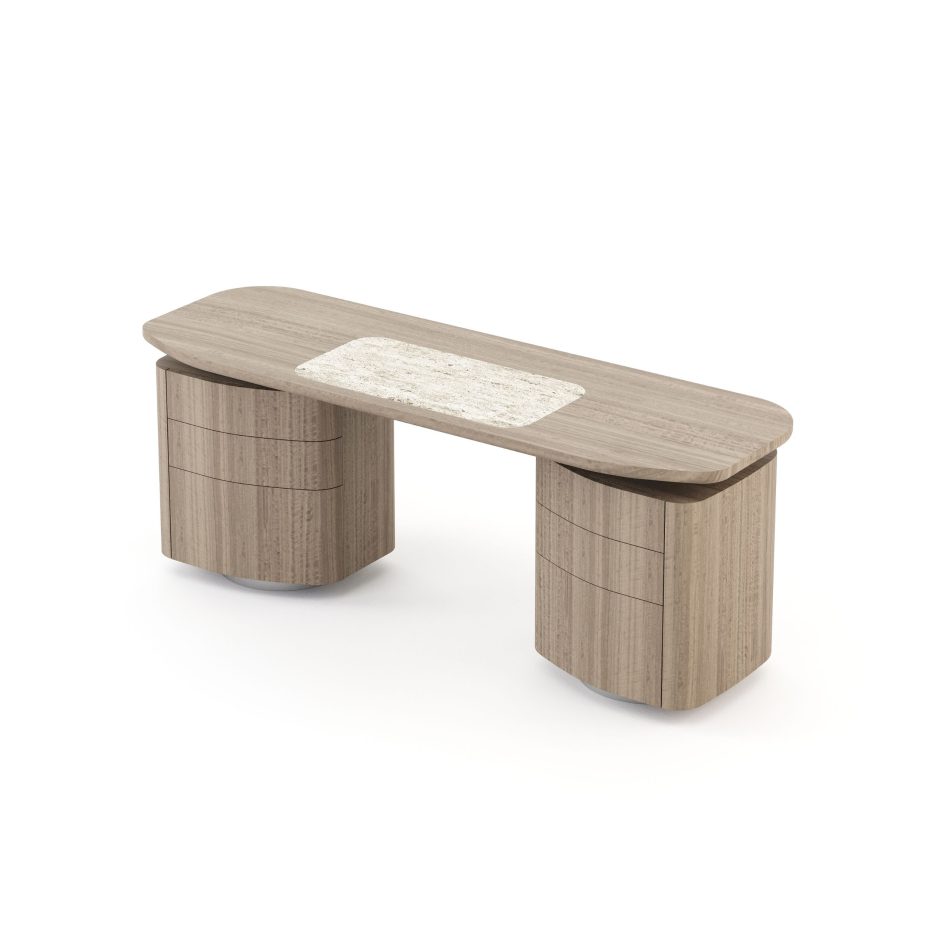 The Stone Desk is shown with a light wooden top featuring a soft central inlay, supported by rounded pedestal bases with integrated drawers and subtle metallic accents, its clean lines and warm finish creating a refined workspace shaped by modern office furniture, gentle layers of workspace styling, refined touches of contemporary craftsmanship, and the understated calm associated with thoughtful interior design inspiration.