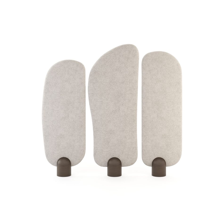 The Stone Screen stands as three softly curved fabric panels rising at different heights, each anchored by a rounded wooden base that gives the composition a grounded stillness. The gentle contours and quiet spacing between the forms create a natural rhythm that recalls stones shaped by time, expressing the calm refinement of luxury home furniture and the meditative clarity of minimalist interior architecture.