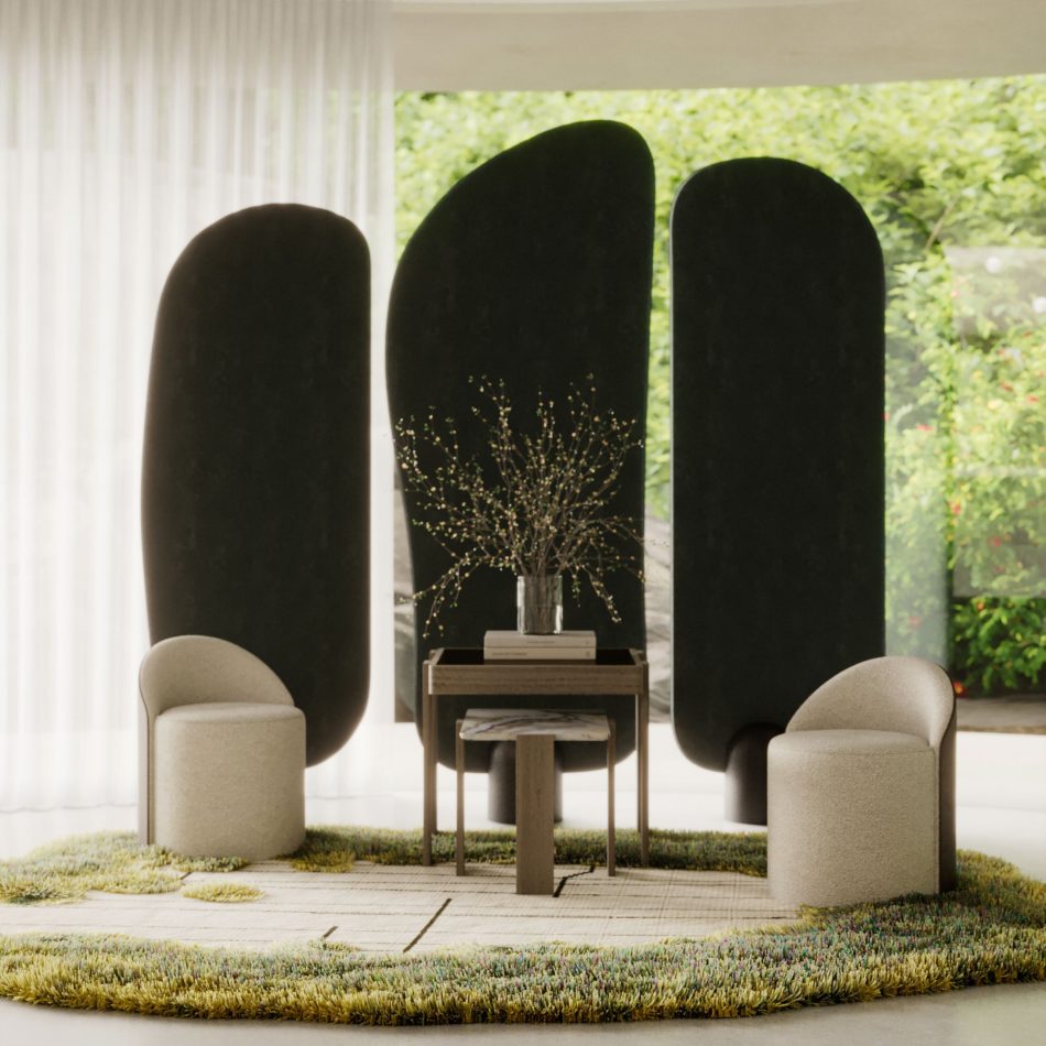 The Stone Screen stands behind the small seating arrangement as three tall, rounded panels wrapped in dark textured fabric, each resting on a dark wooden base that grounds the gentle forms. The soft daylight, the textured rug, and the greenery beyond the window create a warm and contemplative ambiance where the screen’s subtle variations in height and shape bring a sculptural calm to modern living room design.