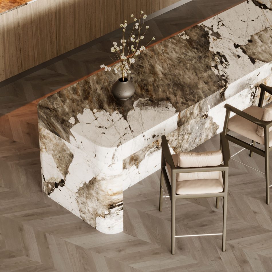 The Toro Bar Stool in wood and upholstered leather sits within a sculptural stone‑and‑wood interior, where soft natural tones, herringbone flooring, and minimalist décor create an atmosphere of calm refinement that resonates with bar furniture, the warm presence of luxury home furniture, and the architectural balance of modern furniture.