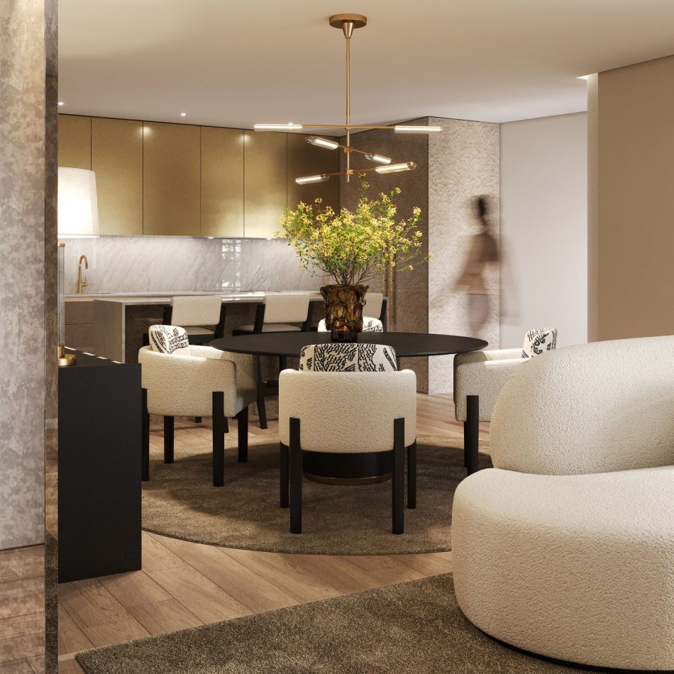 The dining and kitchen areas flow together through warm tones, gold accents, and soft textures. The Her Round Dining Table anchors the space, surrounded by His II Chairs that introduce pattern and comfort. Natural movement and layered lighting enhance the atmosphere, expressing the harmony of luxury home furniture, the crafted identity of modern furniture, and a layout shaped for subtle interior design inspiration.