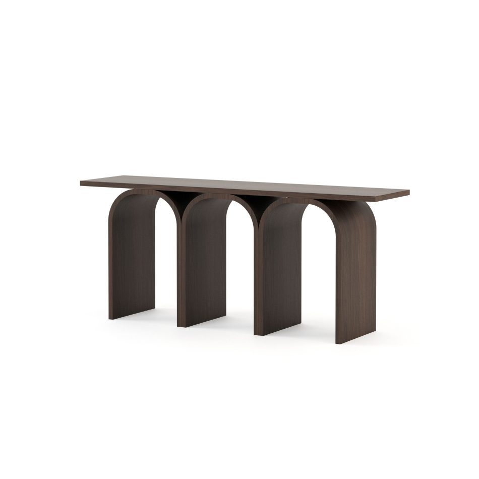 Seen from an angle, the Antónia Console reveals the full rhythm of its arches, rising, meeting and supporting with effortless grace. The warm wood surface catches the light softly, recalling the calm persistence of Antónia Ferreirinha and the bridges that shaped its inspiration. The moment reflects sculptural luxury furniture, thoughtful interior design and grounded homedecor.