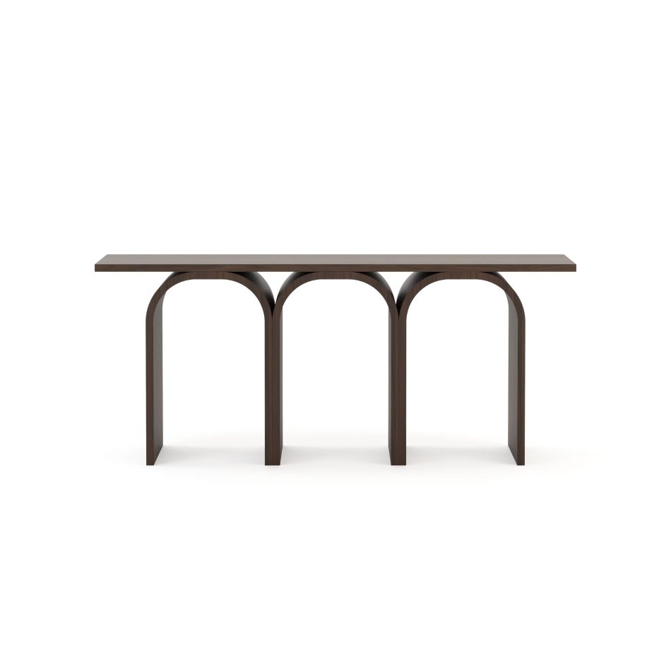 A close view of the Antónia Console highlights the gentle curvature of its arches, carved with the quiet confidence of something built to last. The dark wood reveals subtle shifts in tone as light moves across it, like water passing beneath a bridge. The piece expresses refined luxury furniture, poetic interior design and enduring homedecor.