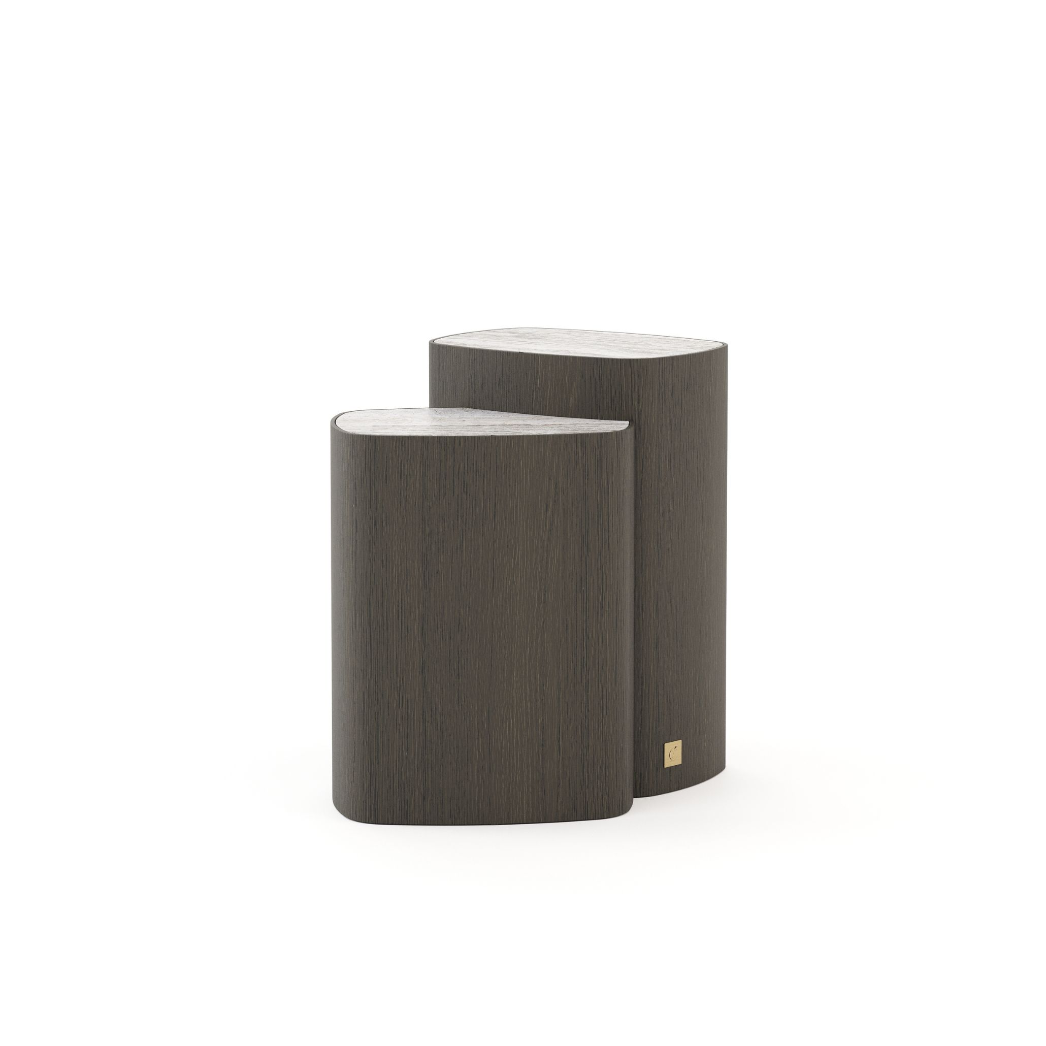 The Dolomites Side Table stands with its softly curved triangular top and dark wood base, highlighting a sculptural silhouette inspired by natural stone forms. A subtle metallic detail at the base adds refinement to the organic shape, giving the piece a quiet, grounded presence. The design reflects expressive organic furniture, the crafted tactility of natural materials, and the sculptural clarity of contemporary design.