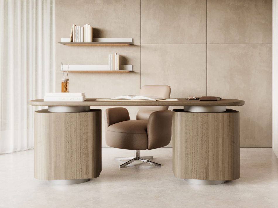 The home office is defined by the Stone Desk, its rounded volumes and natural materiality grounding the space with quiet clarity. Behind it, the Margem Swivel Chair offers soft, supportive comfort, completing a workspace shaped by gentle curves and open surfaces. Floating shelves, warm light and muted tones create an atmosphere of focus and ease, reflecting thoughtful interior design, balanced contemporary interiors and a calm, sculptural approach to architectural design.