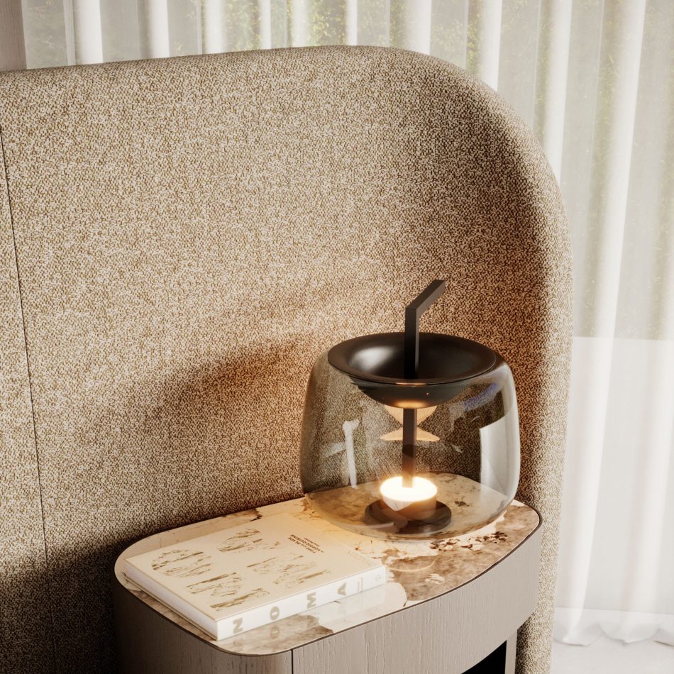 A warm bedside vignette highlights the Stone Bed’s textured headboard and wooden base, paired with soft lighting and natural materials. The composition enhances sophisticated bedroom furniture, curated design details, and serene interior design inspiration.