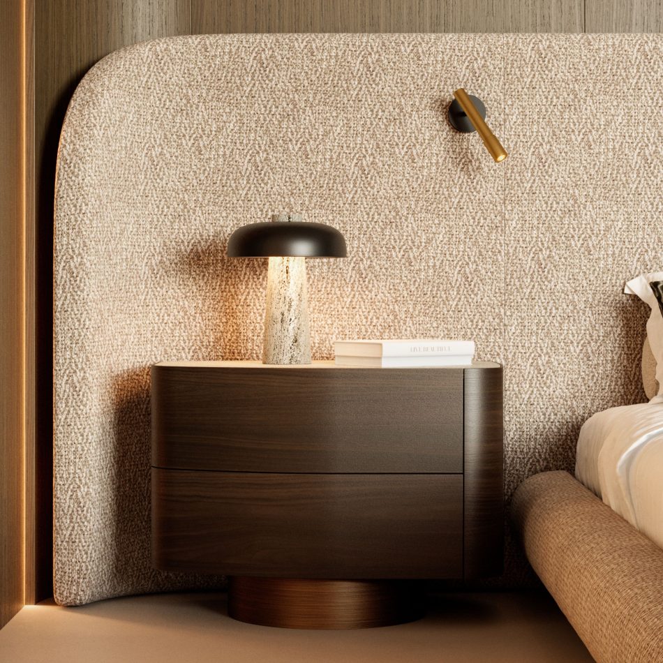 A bedside vignette highlights the Stone Bed’s textured headboard and wooden base, paired with a rounded nightstand and a sculptural pendant light. The composition reflects contemporary furniture, warm bedroom architecture, and refined luxury home furniture.