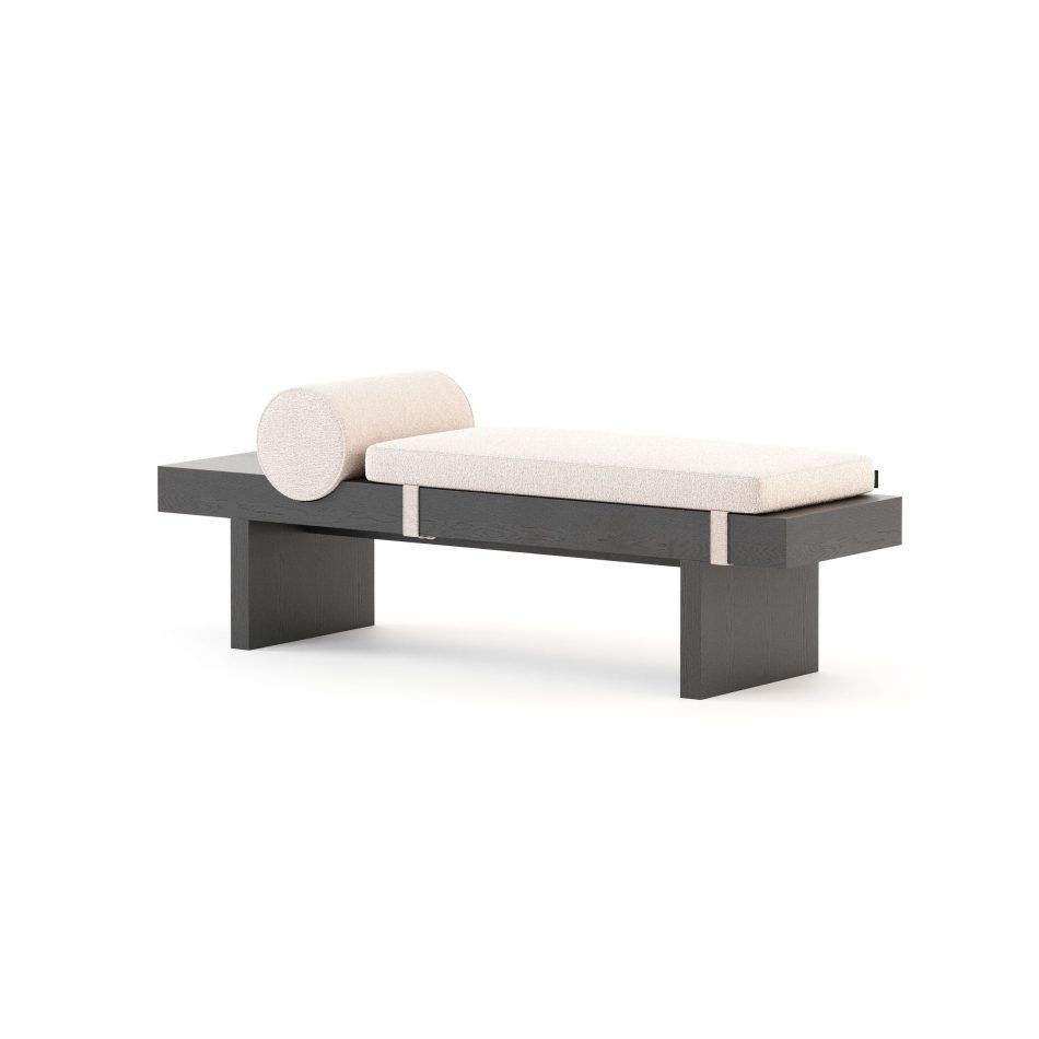The Toro Bench presents a balanced composition of a dark wooden frame and a soft, light cushion, where clean lines and softened edges create a grounded yet airy presence. Its precise proportions and quiet geometry reflect bedroom furniture shaped by handmade furniture craftsmanship, bringing clarity and intention to modern interiors.