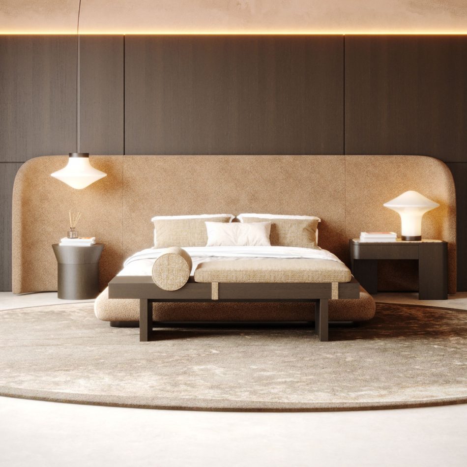 The Toro Bench sits at the foot of the bed, its dark wooden frame and light cushion adding a quiet architectural rhythm to the room. The soft textiles, warm lighting, and layered rugs create a serene composition shaped by luxury bedroom furniture and refined design details.