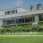 A view of Villa Tugendhat shows its clean white geometric volumes, expansive glazing, and minimalist terraces set within a landscaped garden. The composition highlights Mies van der Rohe’s modernist vision through refined design details, harmonious living room architecture, and timeless interior design inspiration.
