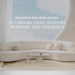 Banner for "Designing Wellness Spaces: Interiors That Support Purpose and Presence," showing a curved bouclé sofa, sculptural side tables and sheer curtains in a soft neutral wellness interior design setting.