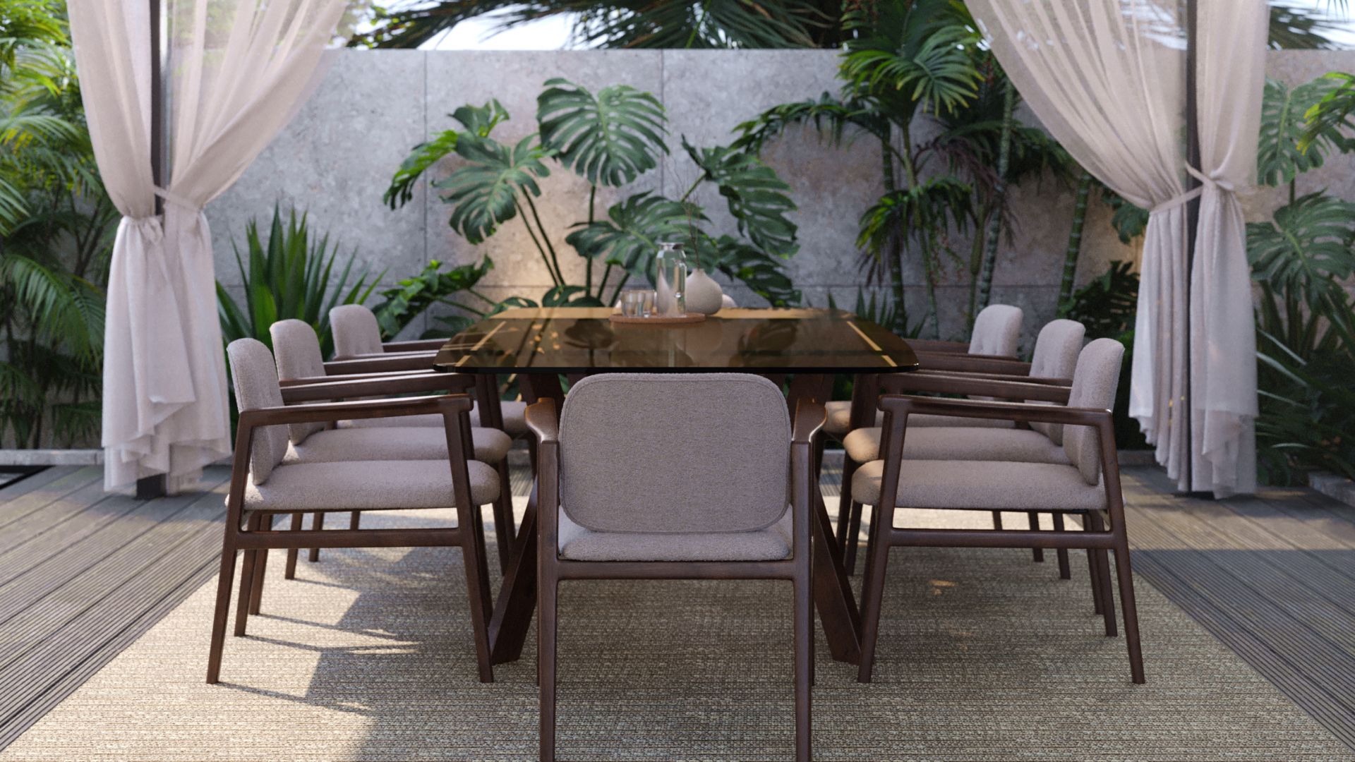 A sheltered alfresco dining area framed by sheer linen curtains and lush tropical greenery, featuring the Toro Dining Table with a dark smoked glass top and sculptural dark wood base, surrounded by the Toro II Chair in warm brown wood with grey fabric upholstery. This luxury dining table set sits on a textured outdoor rug over a timber deck, creating a bespoke dining room atmosphere that transitions effortlessly between covered terrace and interior, embodying the indoor-outdoor flow at the heart of contemporary living room design.