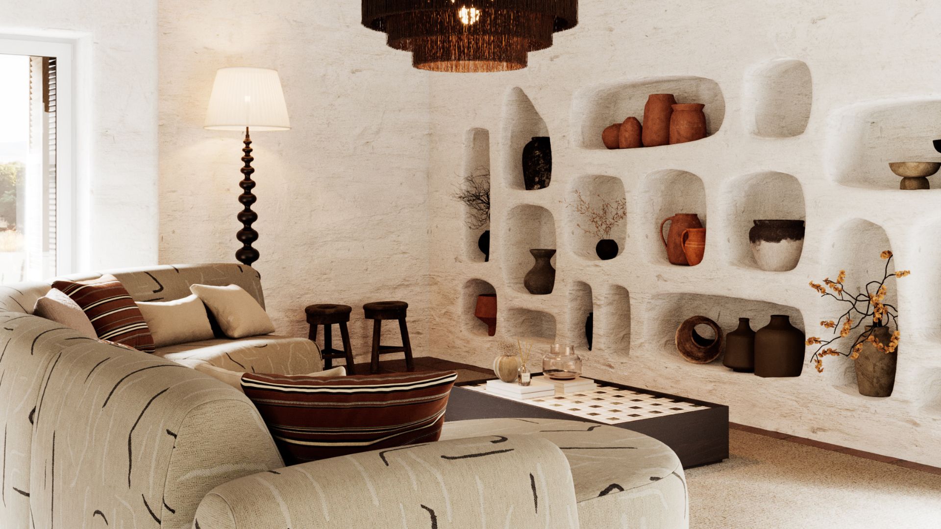 A Comporta wellness center living room where a textured white plaster wall features organic sculpted niches displaying terracotta and ceramic vessels, anchoring the space in interior design inspiration rooted in Portuguese craft tradition. A generous sofa and ottoman in patterned furniture upholstery fabric with earthy stripe cushions sit beside dark solid wood stools and a tiled coffee table, while a fringed pendant and sculptural floor lamp complete this bespoke living room that embodies the handmade furniture spirit of Comporta interiors.